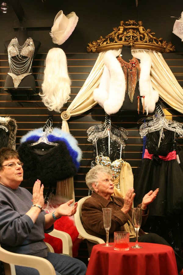 Patrons applaud Derek David after a performance.