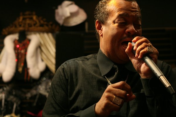 Derek David splits his time between singing at night and ...