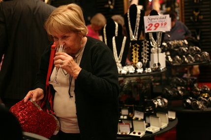 Betty Clark sips champagne while shopping at Duberry's on March 16, 2008.