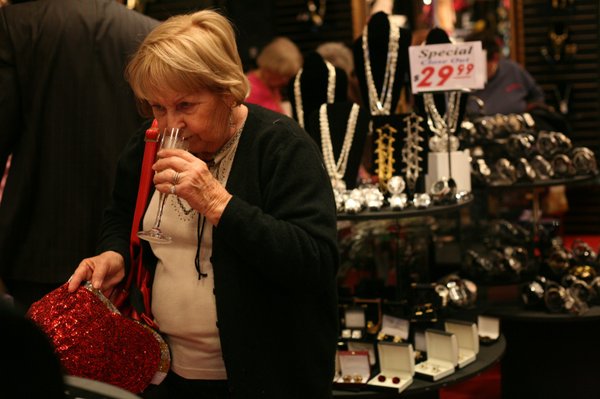 Betty Clark sips champagne while shopping at Duberry's on March ...