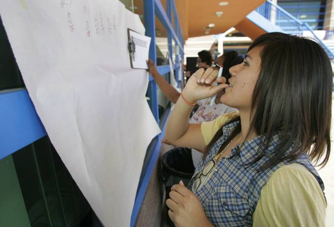 Maria Cordova competes in a "math-off" during lunch at Desert Pines High School on Wednesday in preparation for the statewide math proficiency exam.