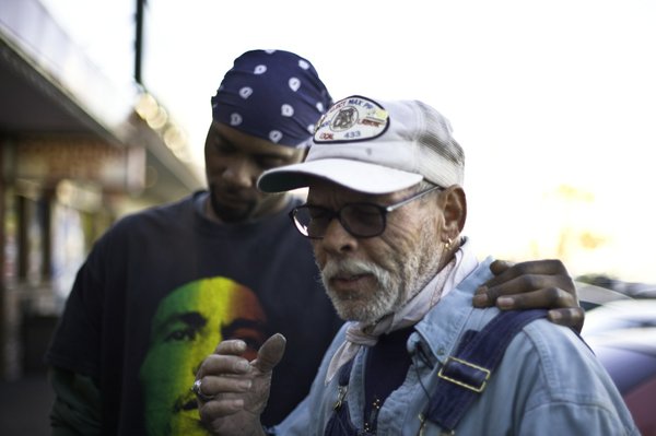 David Rabun Sr. is consoled by Bekeyla Machis, who worked ...