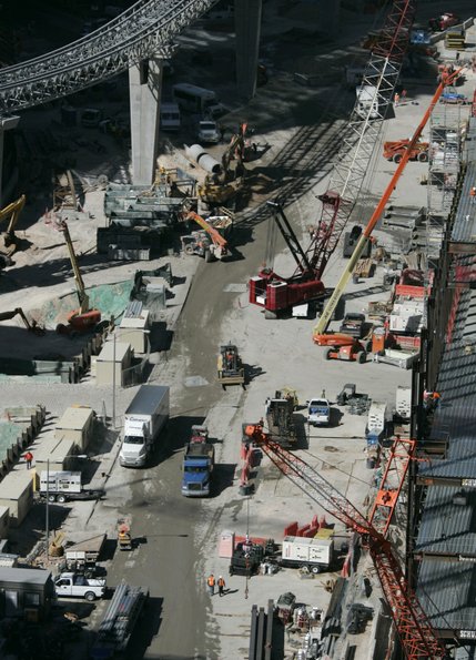 A view from above the CityCenter construction site shows workers walking amid the vehicles of the trade -- cranes and trucks. Workers have described crowded construction sites and consistent pressure to get their jobs done at top speed.