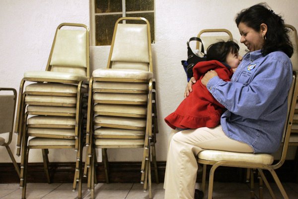JoElda May plays with her daughter, Jade, 4, during services ...