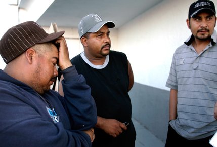 Homebuilders Juan Rodriguez, from left, Jose Sanchez and Jose Castaneda stand outside Los Paisanos Bus Company after saying goodbye to two friends who are going home to Mexico because there's no work in the Las Vegas Valley. 