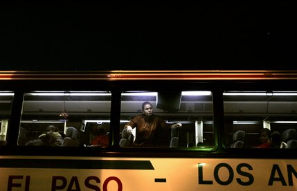 The El Paso - Limousine Express pulls away from a downtown bus station. The manager at this station estimates that 100 people a week are buying one-way tickets to Mexico. They're going home because they
can't find work building homes in the Las Vegas Valley.