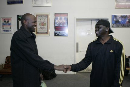 Joseph Kiwanuka, left, visits with trainer Jeff Mayweather during a last visit to Top Rank gym where he used to train. Jeff Mayweather is an uncle to WBC welterweight champion Floyd Mayweather. 