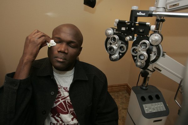 Joseph wipes his eyes in the examination room after having ...