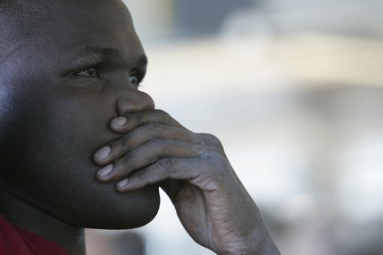 Joseph is thoughtful as he waits for his flight back to Uganda at McCarran International Airport in March.