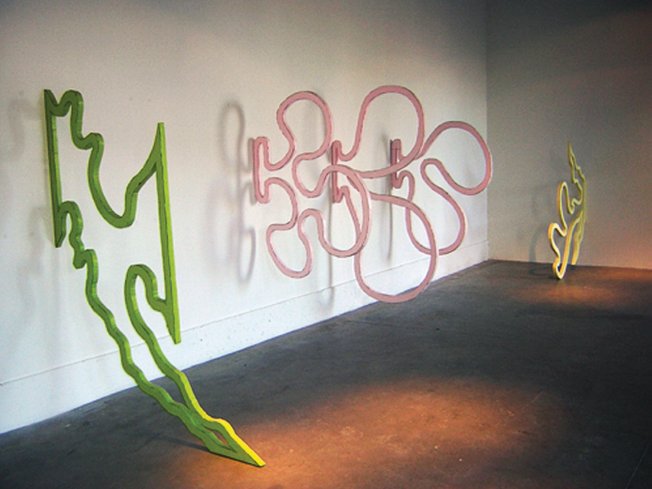 Sculptures in the Patrick Nickell exhibit "Expansionism" at Dust Gallery are crudely 
finished, whimsical, cartoonish lines that reconfigure space.