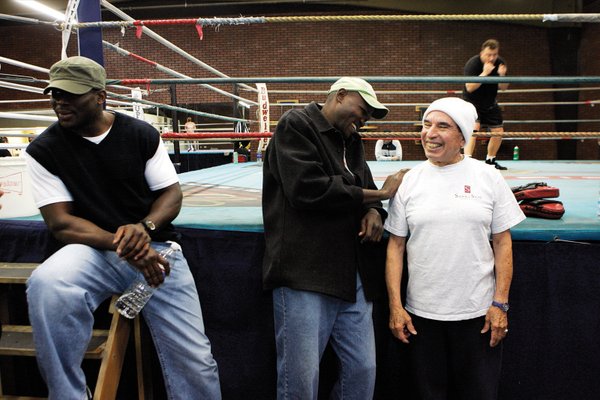 Joseph chats with cornerman Rafael Garcia during a last visit ...