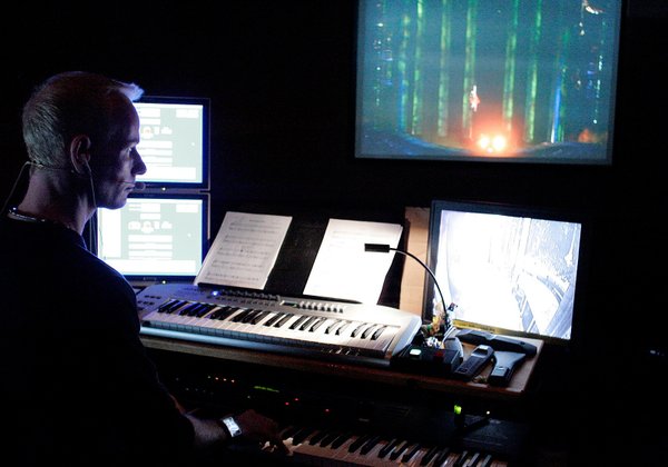 Musical director Richard Oberacker oversees the musicians in 10 performances ...