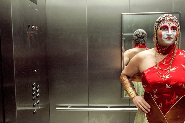 Assistant conductor Janine De Lorenzo takes the elevator up from ...