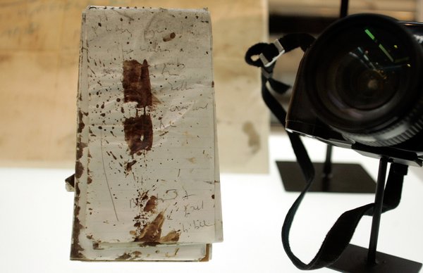TIME senior correspondent Michael Weisskopf's blood-stained notebook from when he ...