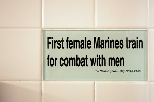 Tiles in the women's bathroom highlight headline bloopers from newspapers ...
