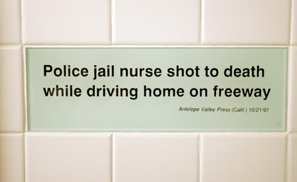 Tiles in the women's bathroom highlight headline bloopers from newspapers collected by the Columbia Journalism Review.