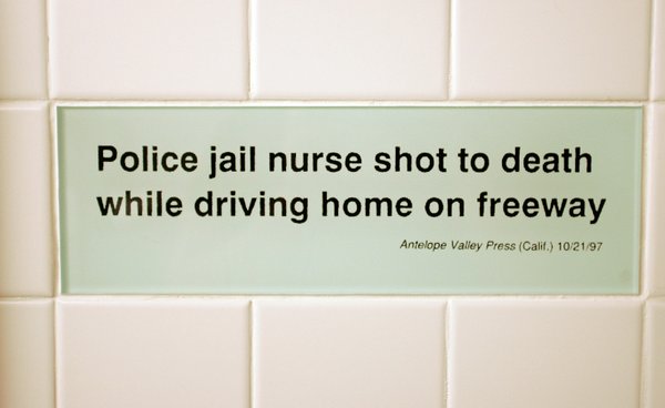 Tiles in the women's bathroom highlight headline bloopers from newspapers ...