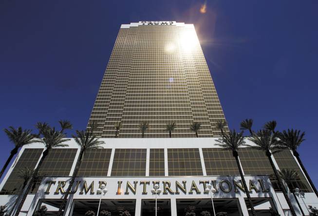 Trump's latest luxury property rises 64 stories over the Strip. A restaurant in the 1,282-suite tower is simply named DJT, his initials. Developers, real estate agents, politicians and beauty queens helped the Donald fete the opening.