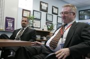 Global Community High School Principal Mike Piccininni, left, and Edward Goldman, Clark County School District associate superintendent of education services, talk about the district's alternative education program during a recent interview at the school.