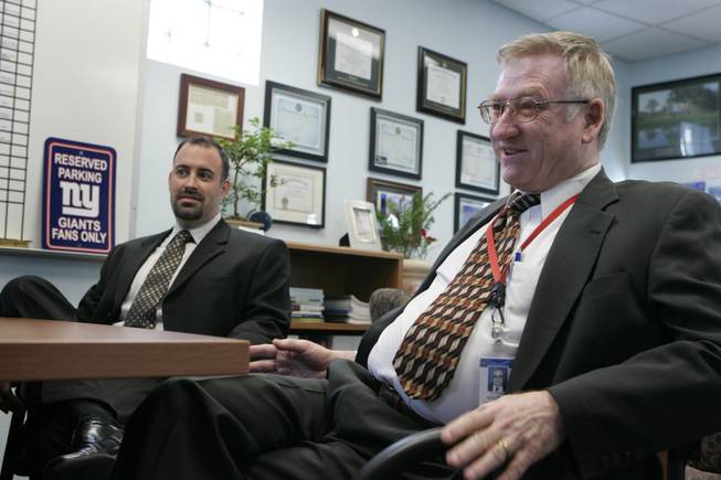 Global Community High School Principal Mike Piccininni, left, and Edward Goldman, Clark County School District associate superintendent of education services, talk about the district's alternative education program during a recent interview at the school.