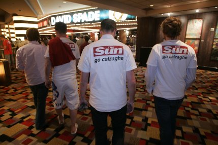 Fans of boxer Joe Calzaghe of Wales head toward the casino floor following a public workout at Planet Hollywood.