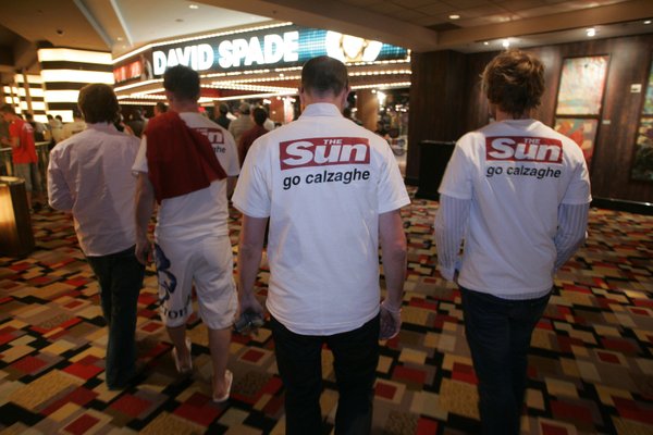 Fans of boxer Joe Calzaghe of Wales head toward the ...