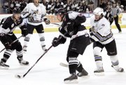 Seitsonen (with puck), who is known in the ECHL for his strong defense, has made some timely offensive plays lately.