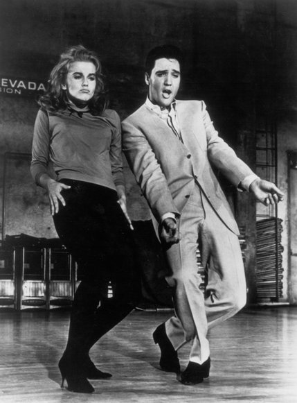 Ann Margaret and Elvis Presley dance together for the filming of MGM's "Viva Las Vegas." Their on-screen chemistry translated to off-screen romance as the two were involved in a highly publicized affair.