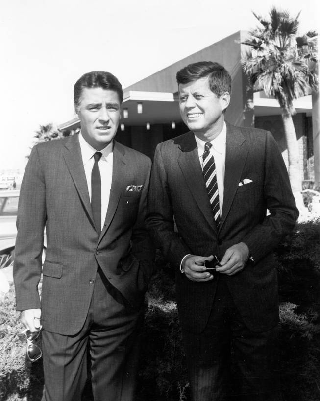 Rat Pack singer Peter Lawford, left, poses with then presidential candidate, John F. Kennedy.  Lawford was married to Kennedy's sister, Patricia Kennedy Lawford, and, along with the Rat Pack, campaigned heavily for Kennedy in 1960.