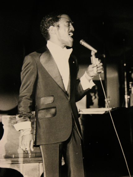 Sammy Davis Jr. gives an energetic performance at the Sands Copa Room. Despite losing an eye and nearly losing his life as a result of a 1954 car accident, Davis continued entertaining until the early 90s.