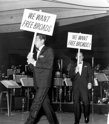 The Rat Pack's Dean Martin and Frank Sinatra carry strike signs demanding 