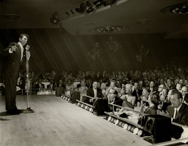 Dean Martin makes his debut in the Sands Copa Room on March 6, 1957.  A year removed from his separation with comedian Jerry Lewis, many doubted Dino's ability to have a successful solo career. Despite the skepticism actresses Lucille Ball and Debbie Reynolds, comedian Jack Benny and Jack Entratter attended the act and can be seen in the audience.