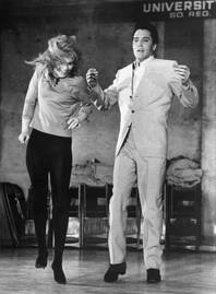 Ann-Margret and Elvis Presley dance together for the filming of MGM's &quot;Viva Las Vegas.&quot; Their on-screen chemistry translated to off-screen romance as the two were involved in a highly publicized affair.