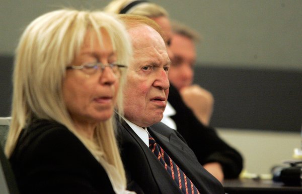 Las Vegas Sands Corp. Chairman Sheldon Adelson sits with his ...