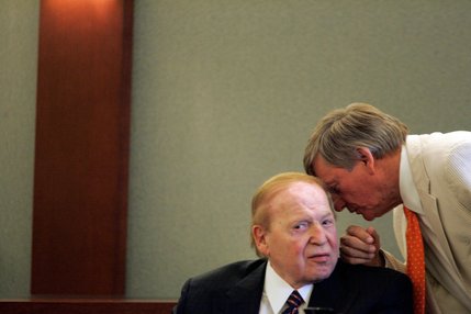 Las Vegas Sands Corp. Chairman Sheldon Adelson, left, confers with his attorney Rusty Hardin. 