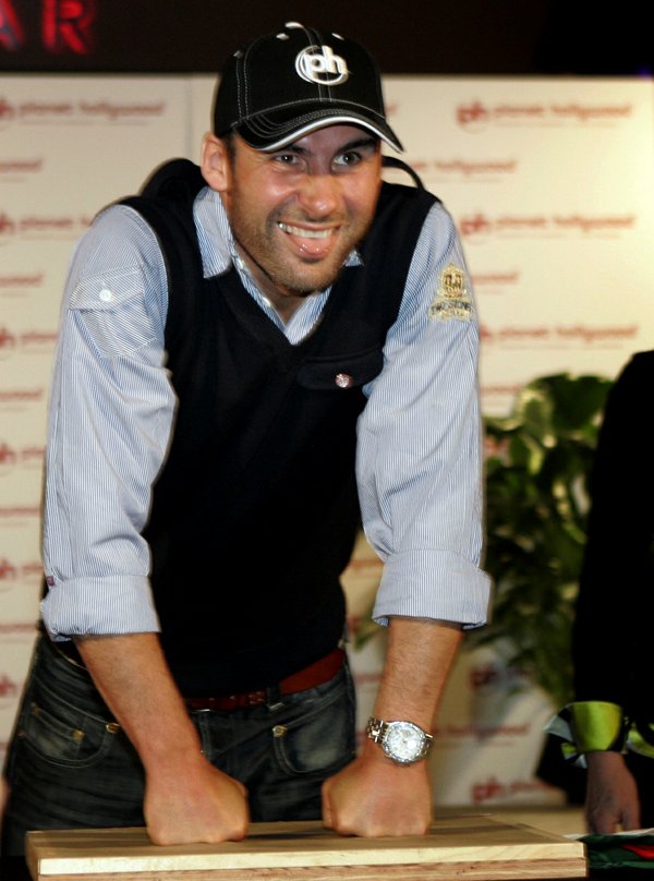 Boxer Joe Calzaghe of Wales makes imprints of his knuckles ...