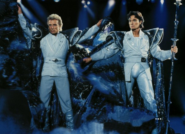 Siegfried & Roy greet audiences on this postcard advertising their ...