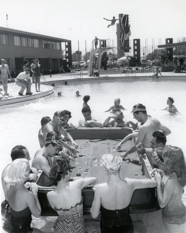 Guests at the Sands play Craps on a floating table ...