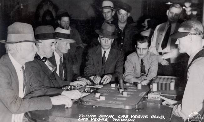 Patrons of the Las Vegas Club partake in a game of faro (misspelled ferro in the photo). The dealer dealt two cards per turn from a standard deck of 52, and the object was for players to predict which cards would appear. The first card would win for the bank, and the second would win for the player. Because of the game's almost even odds, it is no longer offered at modern casinos.