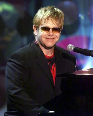 Sir Elton John performs "Your Song" during the Radio Music Awards at the Aladdin Theatre for the Performing Arts on Oct. 26, 2001. John also received the Legend Award during the show which was broadcast live on the ABC network.