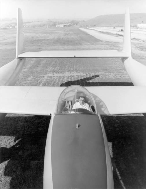 Howard Hughes sits in the cockpit of his prototype XF-11 ...