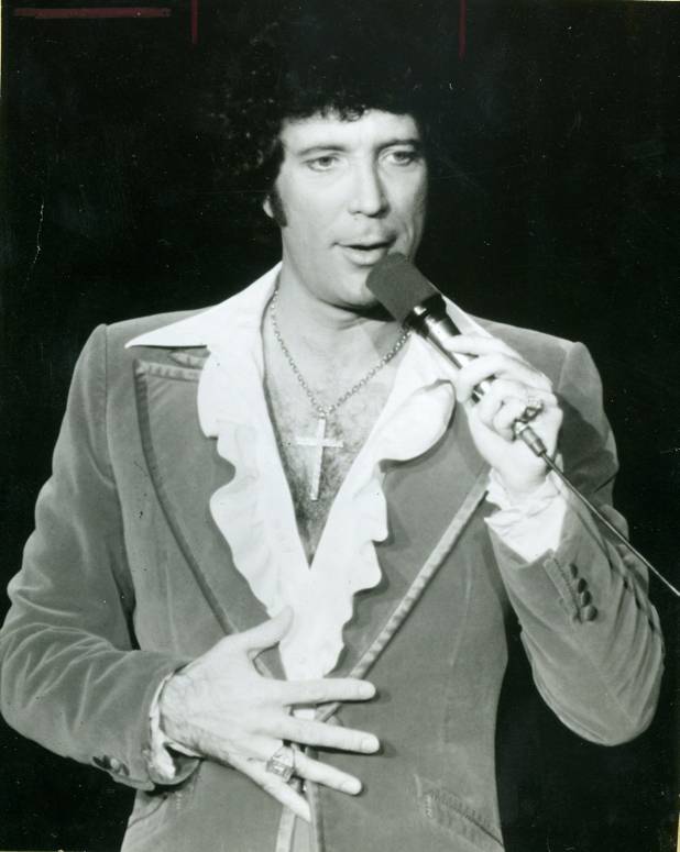 Tom Jones sings before the audience during a show at ...