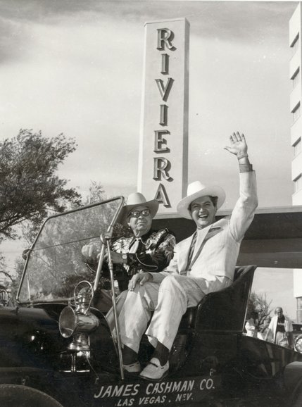 James Cashman, Sr (left) and Liberace (right) arrive at the grand opening of Riviera Hotel on April 20, 1955.  Liberace was the headlining act of the Riviera throughout the 50's and 60's.