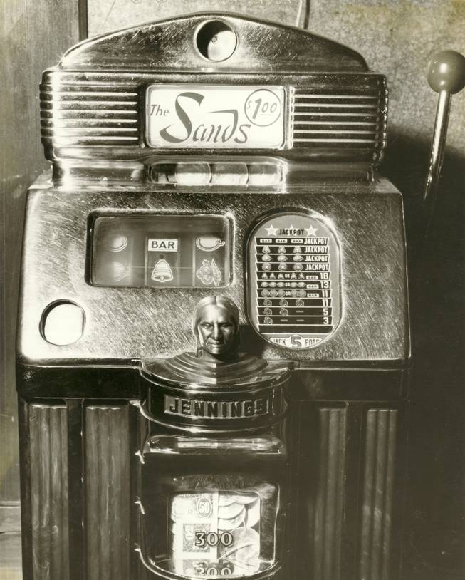A 1959 Jennings $1 Star Chief slot machine is shown in this photo. These self-serve mechanical devices featured the latest in gaming technology like blinking lights and jam-resistant coin slots. The chief's head was provided for good luck.