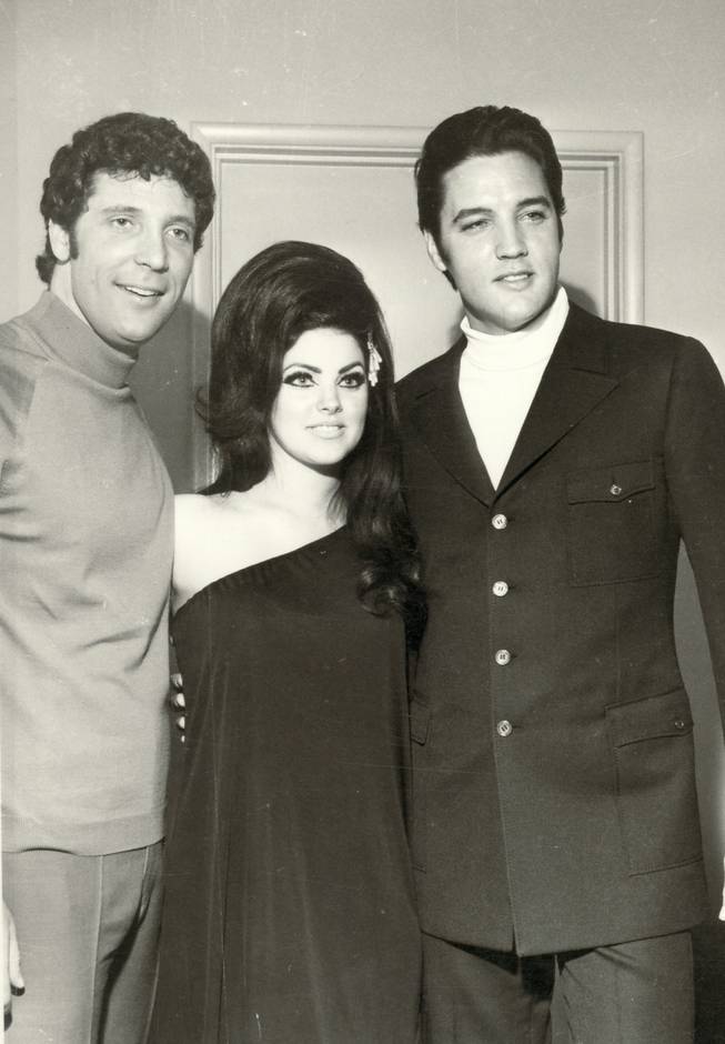 Tom Jones poses with Priscilla and Elvis Presley for this photo, taken July 1, 1971. Jones credited Elvis for inspiring him to become a singer. The two became good friends, spending time together in Las Vegas until Elvis' death on Aug. 16 1977.