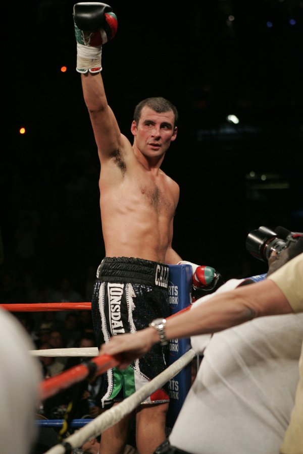 Joe Calzaghe of Wales celebrates his split decision victory after ...