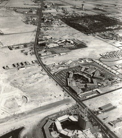 An aerial view of Highway 91 in the mid-1950s shows the isolation of the Flamingo and Dunes hotels (near the bottom of the photo) from the rest of Las Vegas. The large golf course, now the Wynn Golf Club, is one of the few plots of land that has maintained its boundaries throughout the years, although it's layout and landscaping have seen significant alterations. 