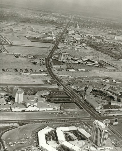 Development along the Las Vegas Strip came at a time when the nation was just beginning to embrace a complete car culture. Trolleys and commuter rail systems were being pulled out of major cities to make way for retrofitted freeways and extra lanes. Planners considered Las Vegas a fresh start for a revolutionary type of city building. The Strip was designed to function without traffic lights or stop signs as this 1968 picture shows.