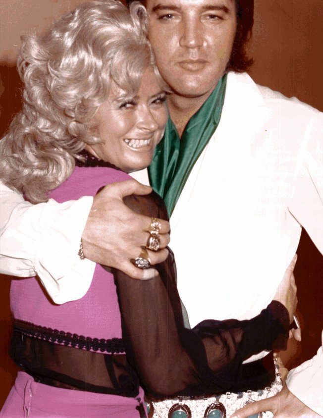 Janie Steele hugs Elvis Presley in this 1960s photo. Steele has retired after nearly 30 years at the Hilton, where she worked in photography and bookkeeping.