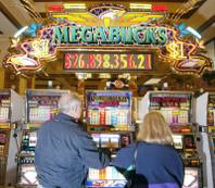 Dan Healy and his wife Margaret Healy try their hand at winning Megabucks at Sunset Station. Megabucks is a progressive dollar slot machine, which means that the more money people put in, the bigger the jackpot gets. Jackpots hit have ranged from $7 million to $39 million. 